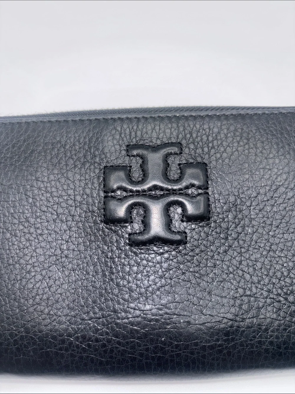Tory Burch sleek zip